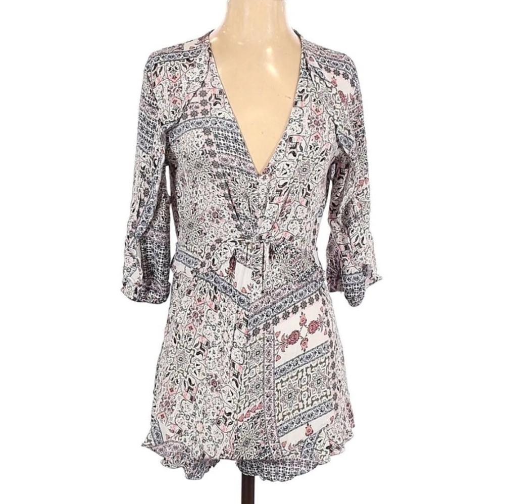 Three Days V neck Abstract graphic print romper back zipper ruffle detail Med.